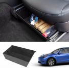 Oppbevaringsskuff under forsetet - Model Y thumbnail